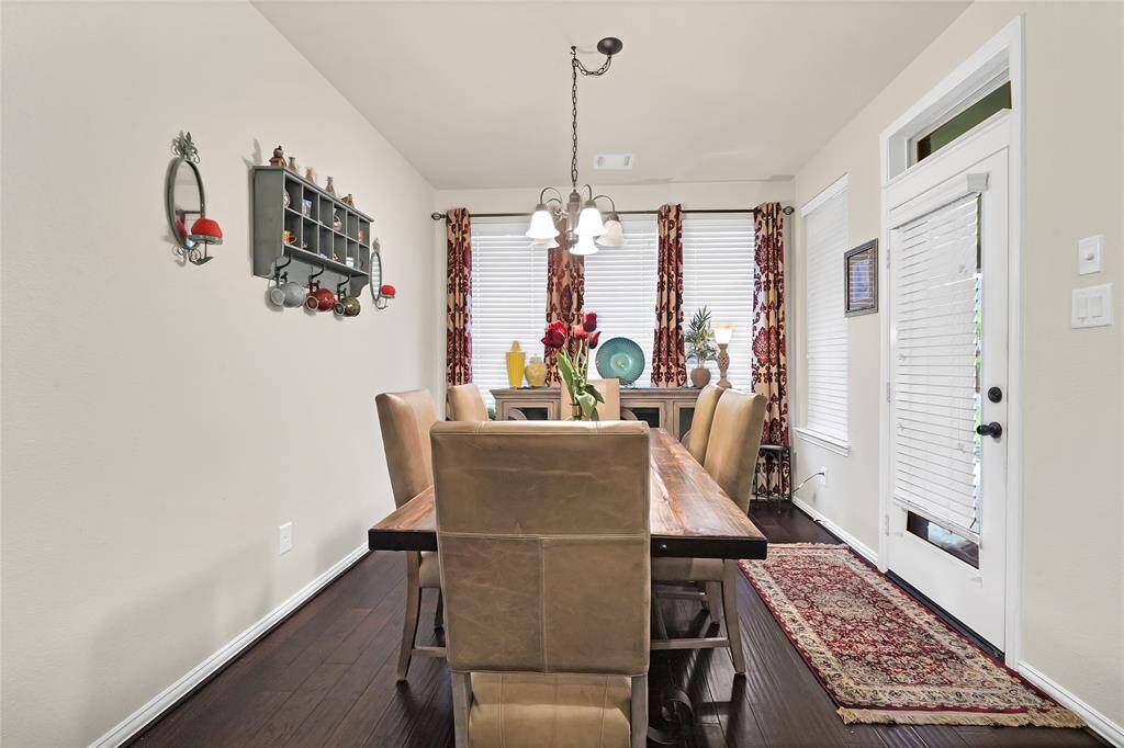 Charming breakfast area just off the kitchen is the perfect place for a quick meal or a cup of coffee.