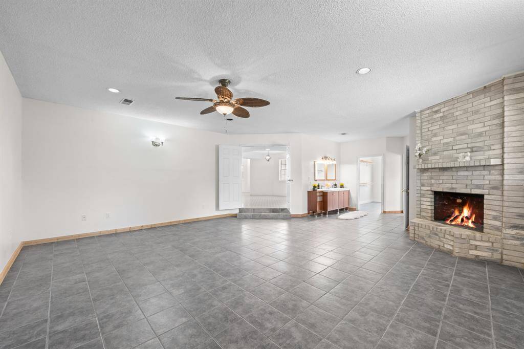 Primary bedroom with fireplace