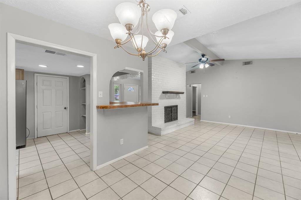 Family room, dining, and kitchen offer a semi-open layout—distinct spaces that still feel connected, perfect for both everyday living and entertaining.