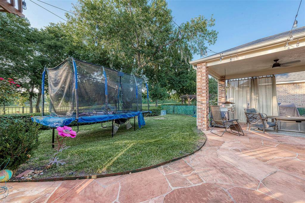 Additional stone patio area in the backyard
