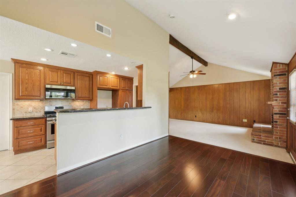 This excellent floorplan keeps the space open but not too open. Half-wall in the kitchen allows views of the dining room and out to the yard keeping the kitchen space open and bright.