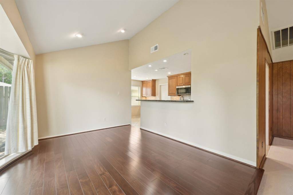 A breakfast nook sits at the end of the kitchen to the left of the garage door offering a secondary eating space if you want to use the dining area for another purpose.