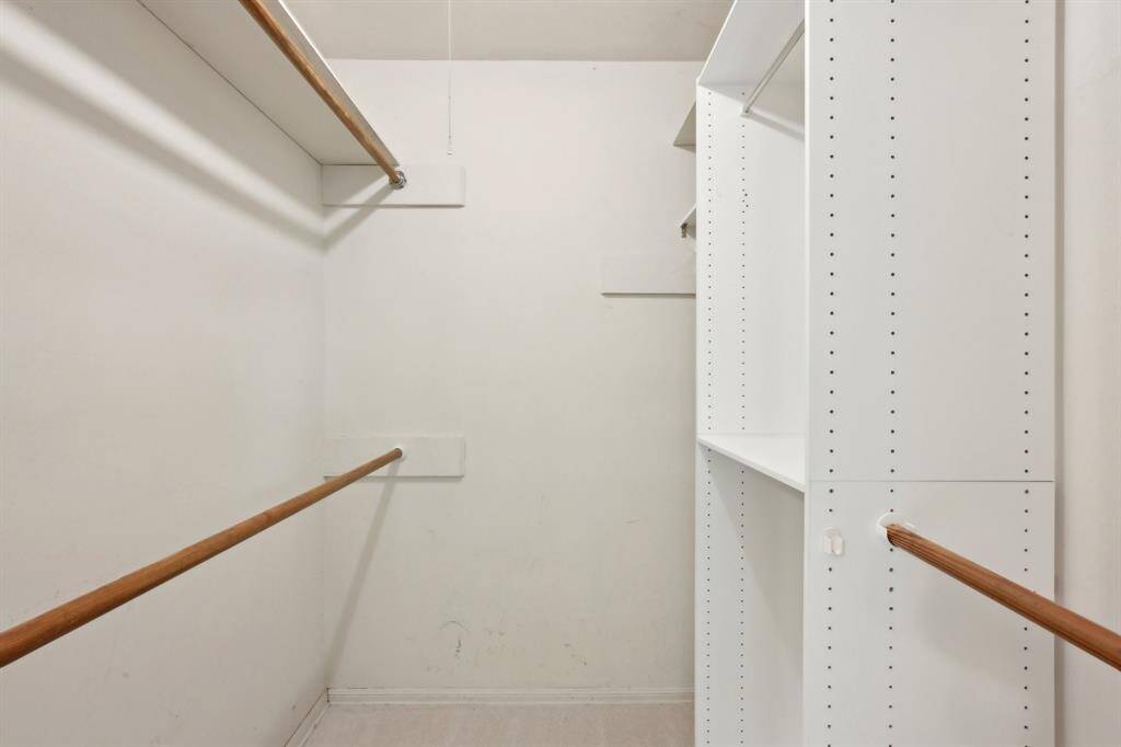 Primary bedroom has a fantastic walk-in closet.