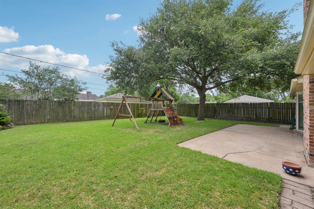 Extra large slab provides room for seating and grilling. Playset is included.