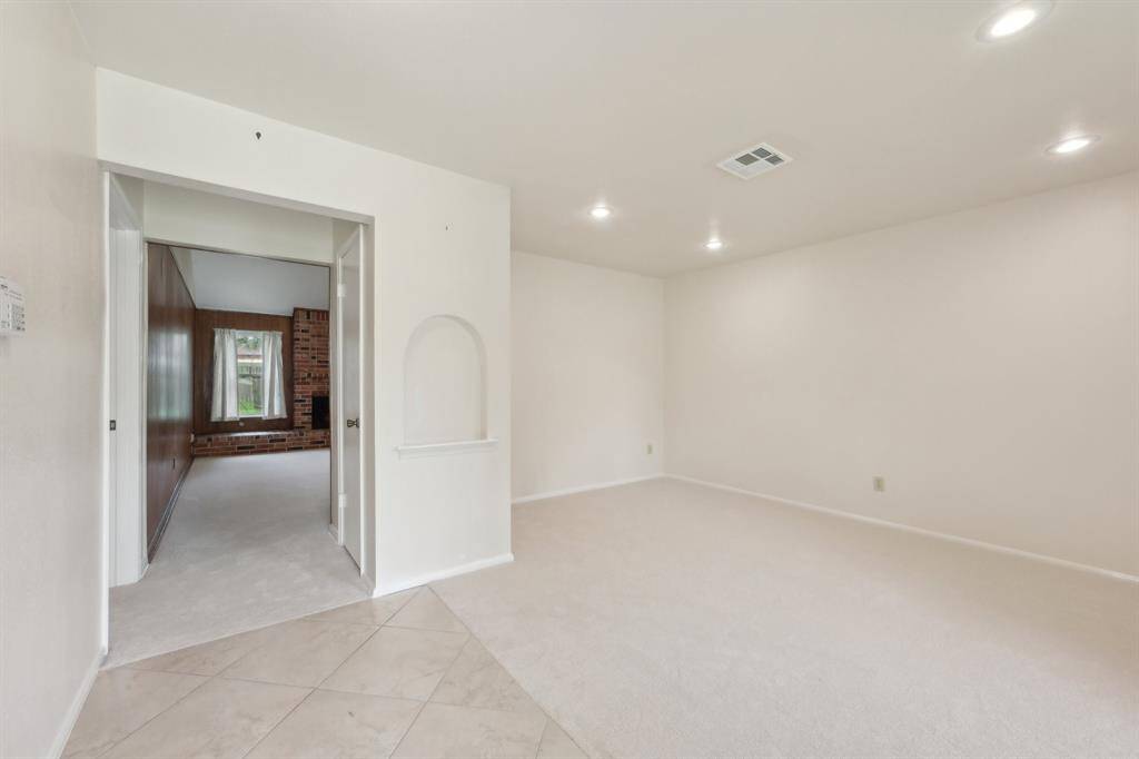 Welcome in to this tastefully updated home. New carpet and paint. This formal living room could be used for many purposes including a game room, work out space, home office or more.
