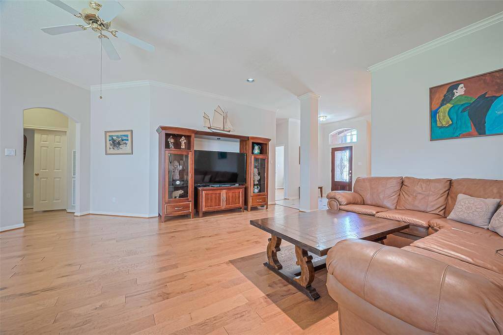 ideal for entertaining or relaxing. Comes furnished with L shaped leather couch and entertainment center.