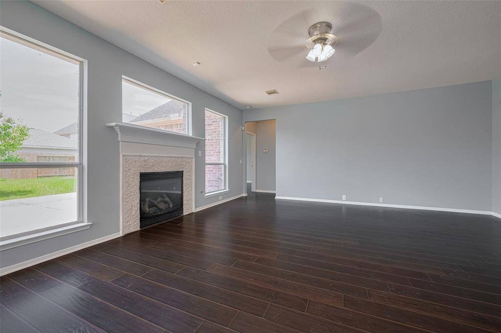 Family Room with Gas Fireplace into Primary Bedroom