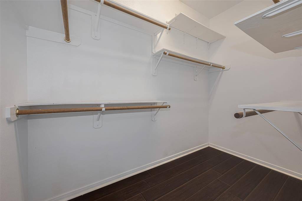 Primary Bedroom's Walk-In Closet Left Side