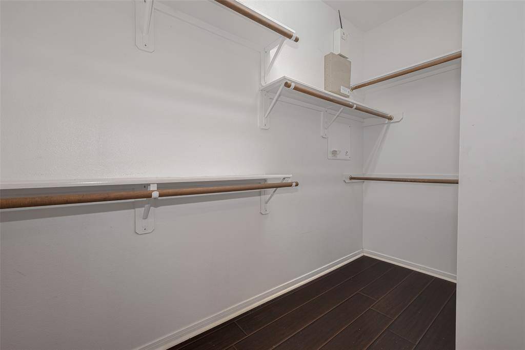 Primary Bedroom's Walk-In Closet Right Side