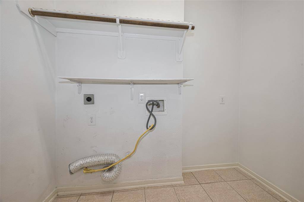 Utility Room with Washer and Dryer Connections, coming from Foyer, hallway on right