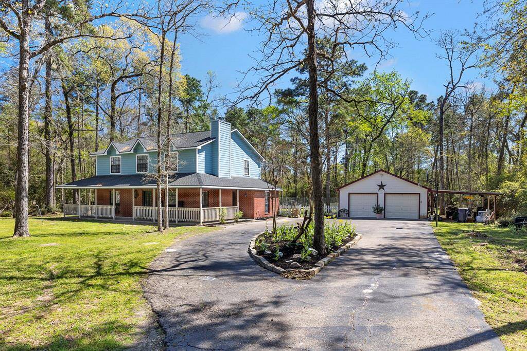 Home has 4 bedrooms, 2.5 baths, game room, formal dining and island kitchen. The detatched garage has 2 bonus rooms that are not included in the room dsecriptions online. The spaces are verstile and can be used for several things.