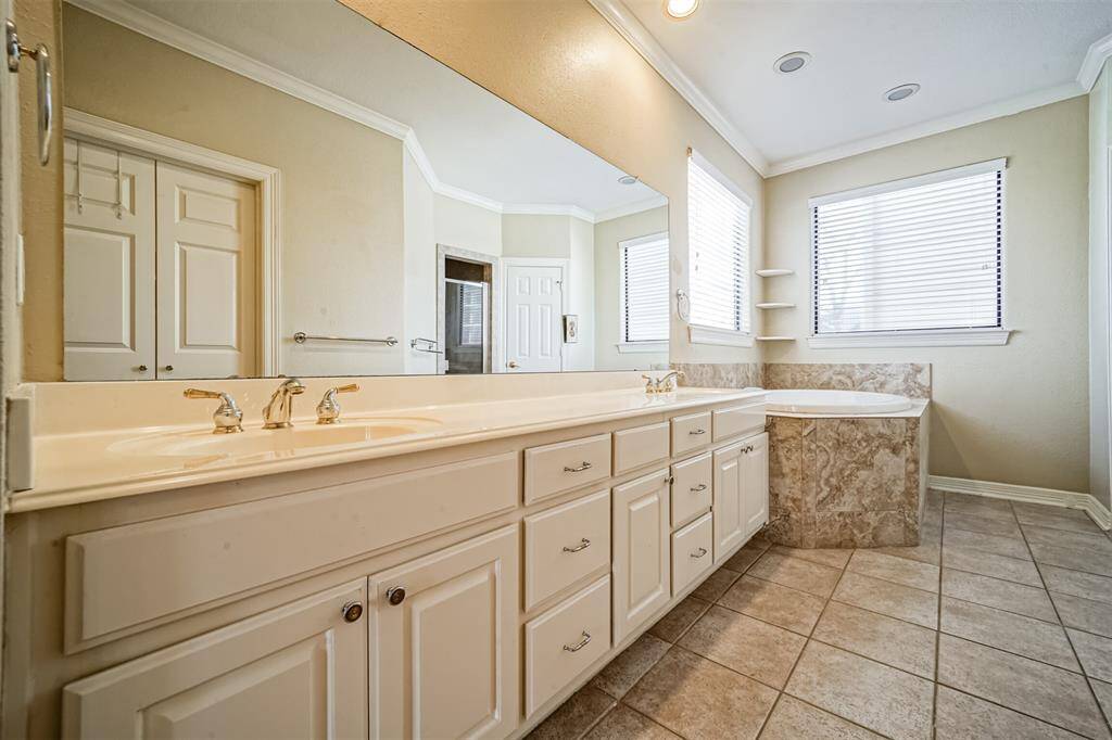The balcony offers a clear view of the neighborhood, offering a glimpse of the urban surroundings.