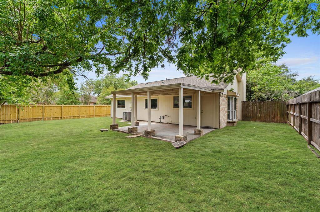 Great fenced yard plenty of space for gardening and more!