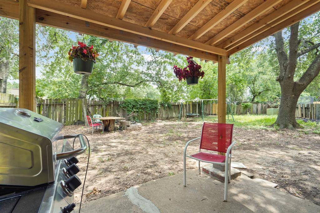 This unit has a covered patio and oversized lot