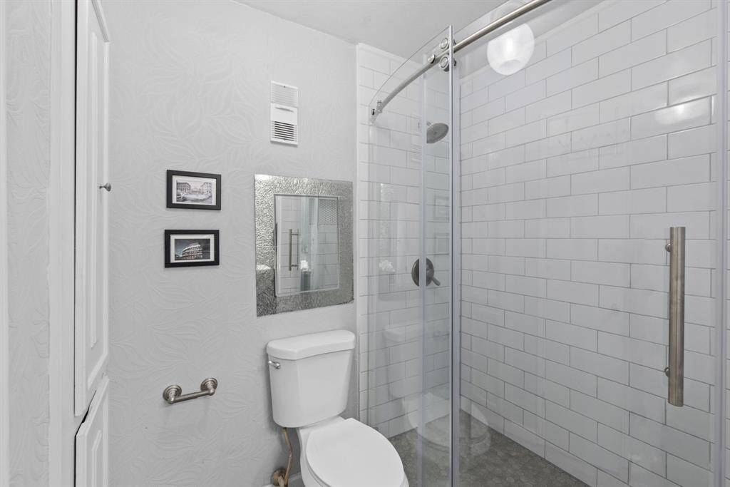 View of the updated glass shower.