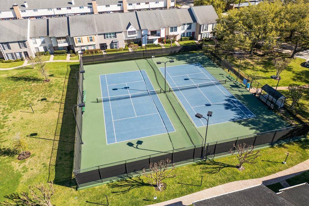Neighborhood tennis courts and plenty dog walking space