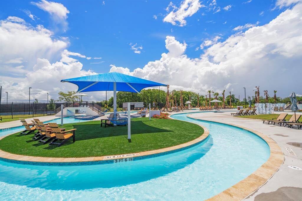 The community offers  multiple areas  for entertainment. It features a recreation center, various pools, dog park, hike and bike trails and it is zoned to Alvin.