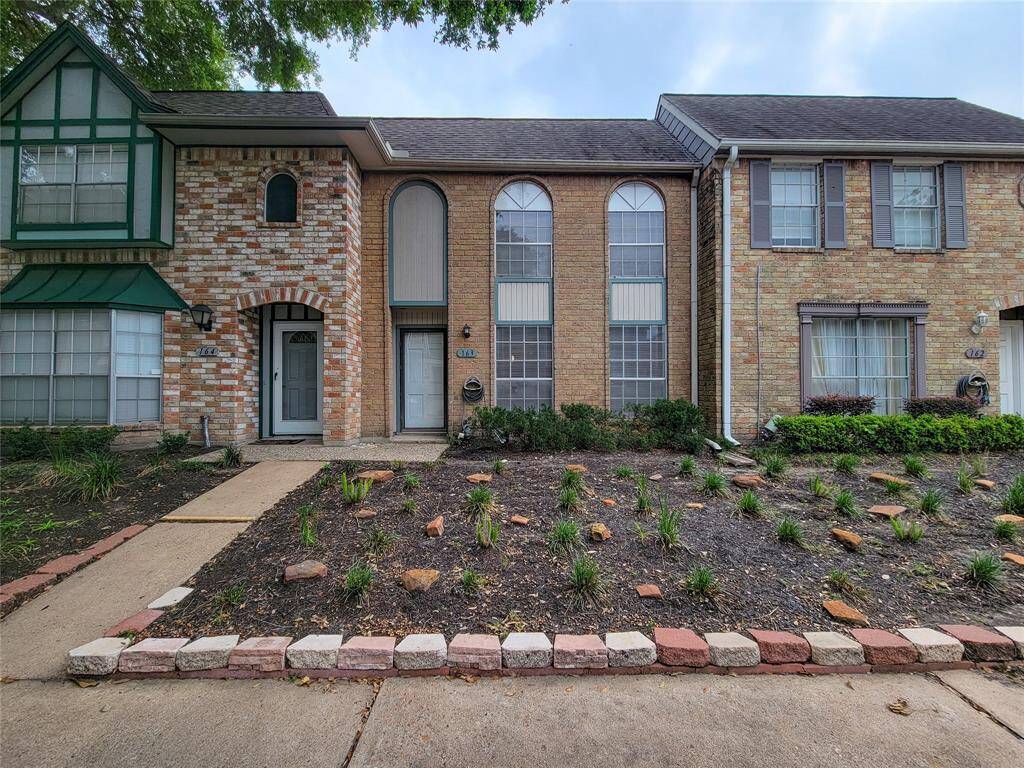 This spacious condo has three bedrooms and two and a half bathrooms. The complex has nice landscaping.
