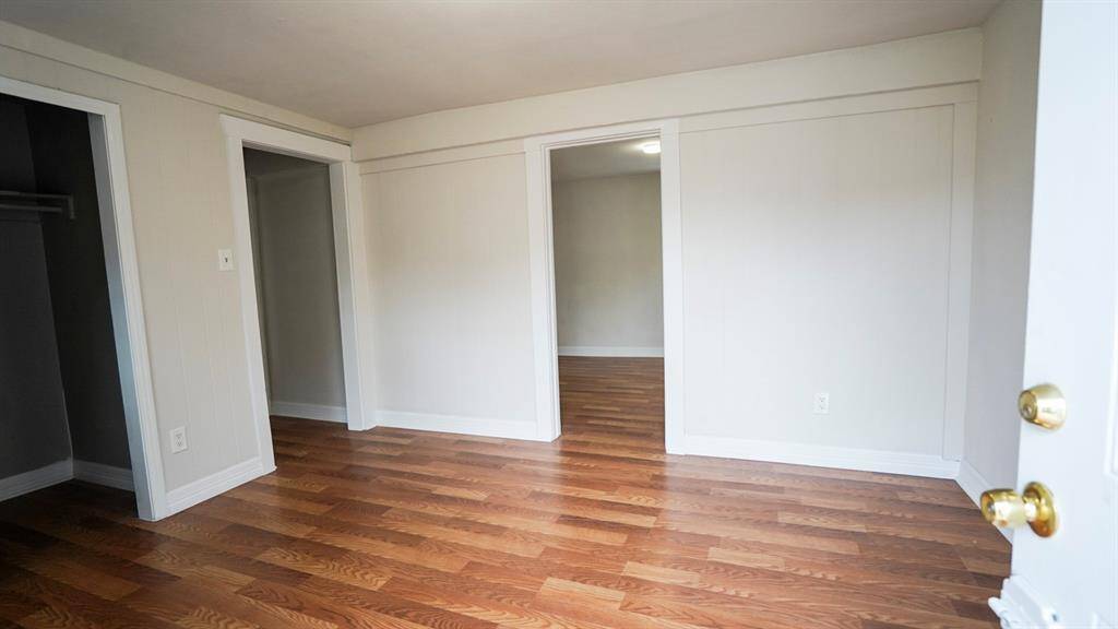 Unit C from front door. Doors to kitchen , bath and bedroom