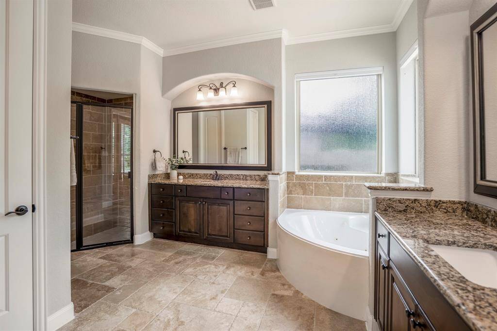 Primary bathroom with separate shower and soaking tub