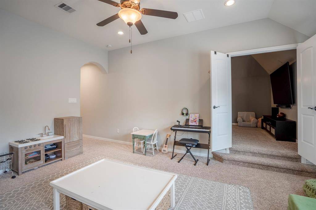 Upstairs media room right off the game room