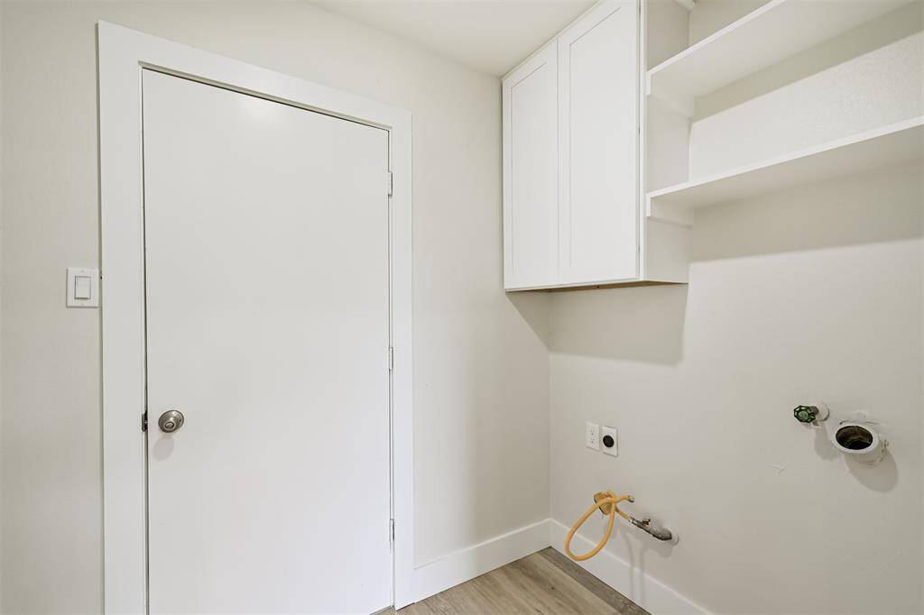 laundry room - pantry cabinet on opposite wall