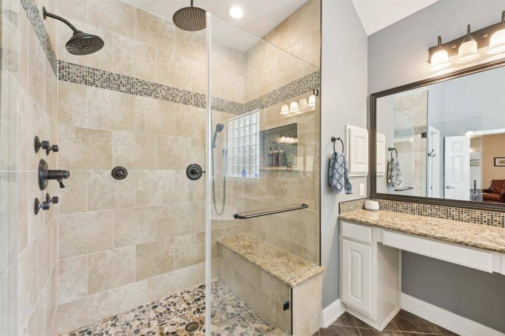 Updated walk-in shower w/3 shower heads and body sprayers!