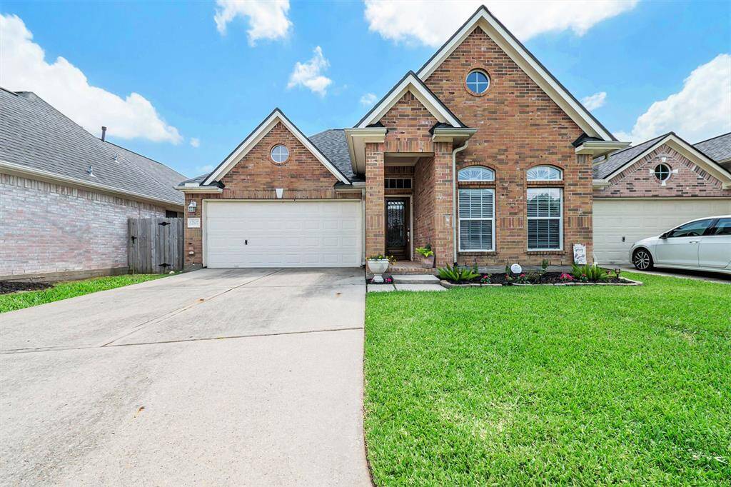 Welcome to your DREAM home at 12107 Lakewood Villa Drive in the gated Villas at Lakewood Park.