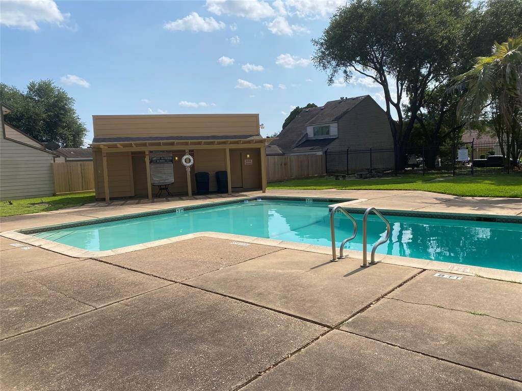 Swimming pool close to house