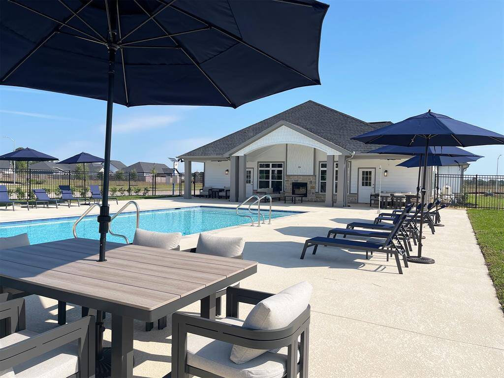 Relax by the oasis outside year round with the heated pool and bocci ball.
