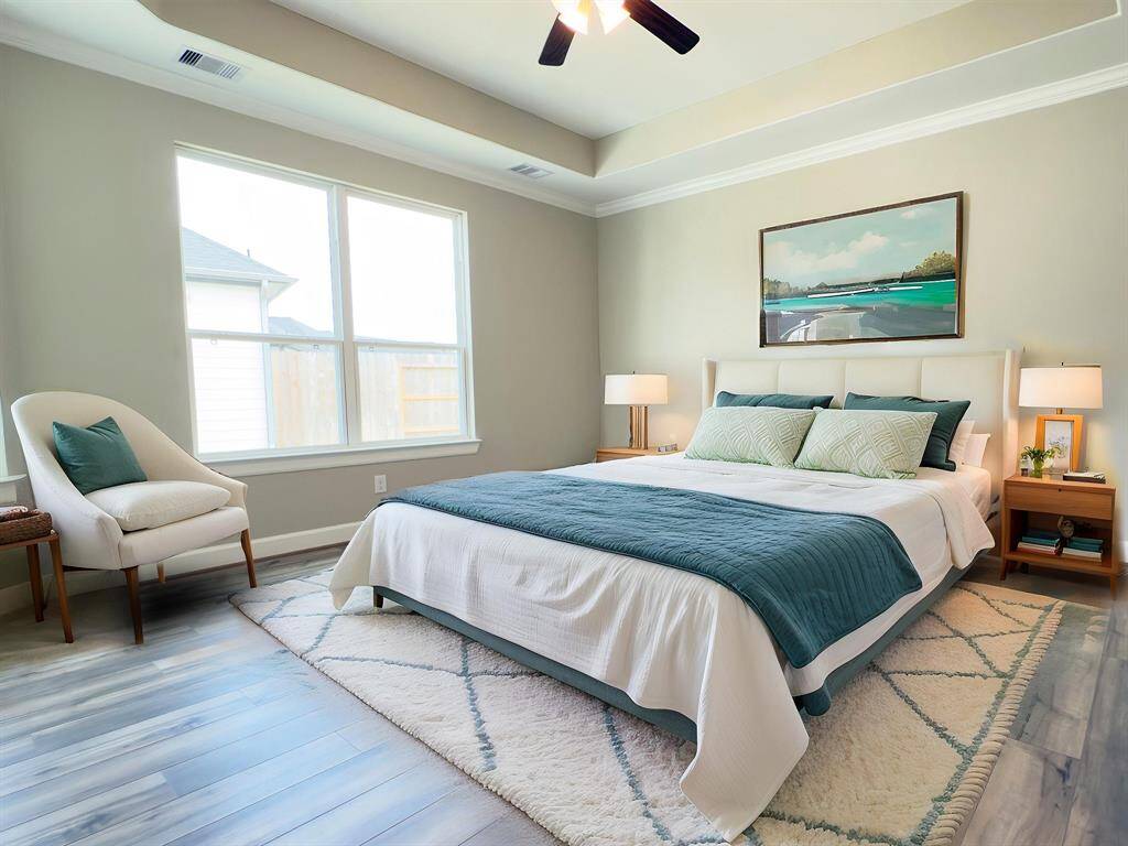 Discover the epitome of luxury and tranquility in the Portico's primary bedroom at Winfrey Estates. This elegant retreat features spacious interiors, exquisite finishes, and a serene ambiance, providing the perfect sanctuary for rest and relaxation. *Image depicts similar floorplan in the community.