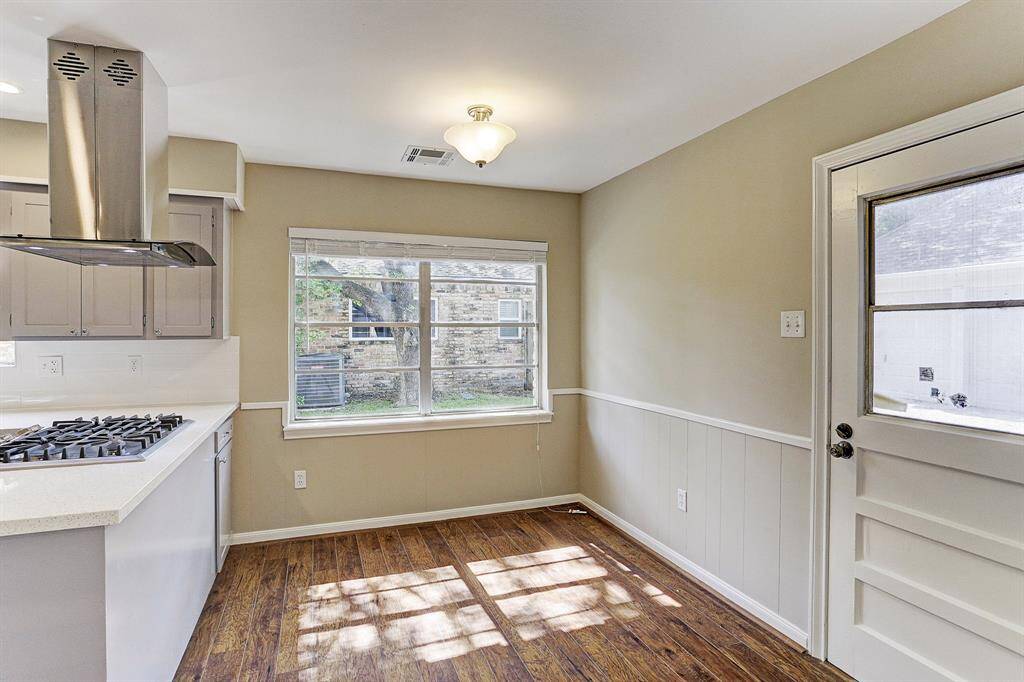 Spacious Breakfast Area Leading To Utility & Backyard