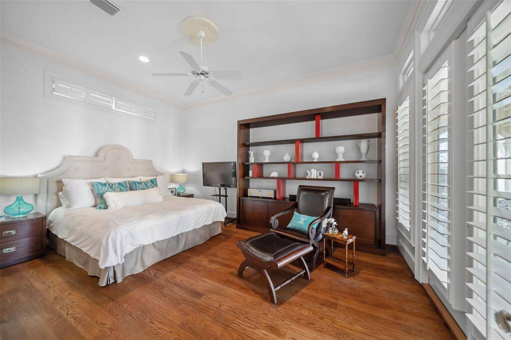 Extra 1st Floor Bedroom Suite  -Split plan located nearest the Kitchen on the opposite side of the home from the Primary Suite.  Has a full bath with a water closet with tub & separate shower.