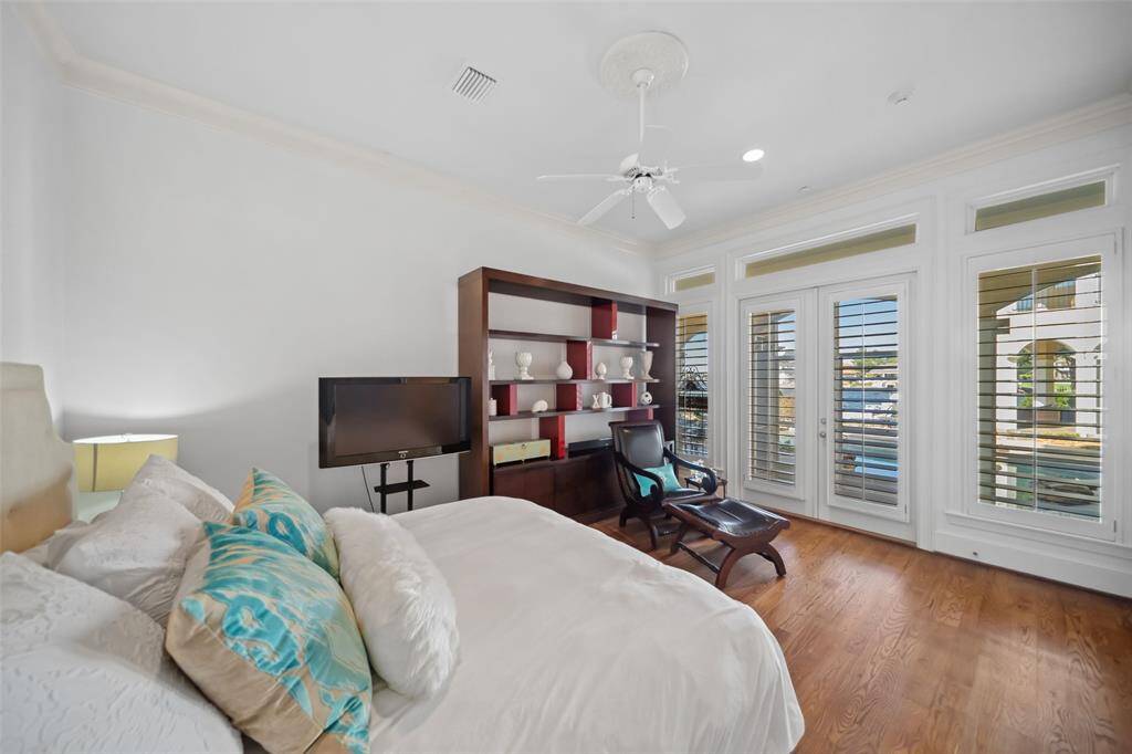 Bedroom Two  -Alternate view showing the pool & lake access.