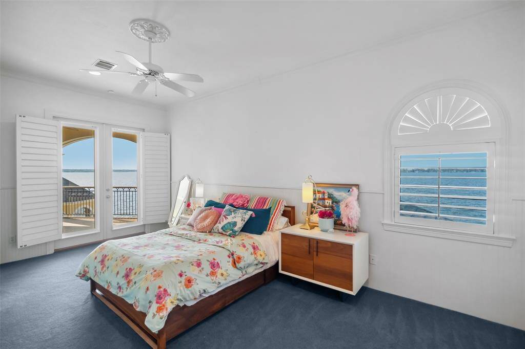 Bedroom Three  Offers access to the Terraces; has its own private sink with vanity seating & shares a jack-n-jill bath with Bedroom Four.