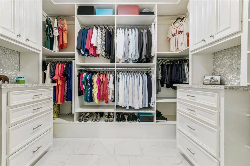 A closet lover’s dream: massive space with built-ins to keep everything neat.