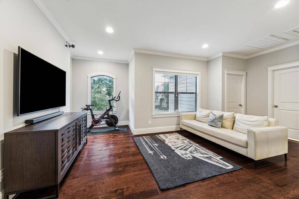 Light-filled upstairs space designed for play, games, and good times, with three bedrooms and two full baths.