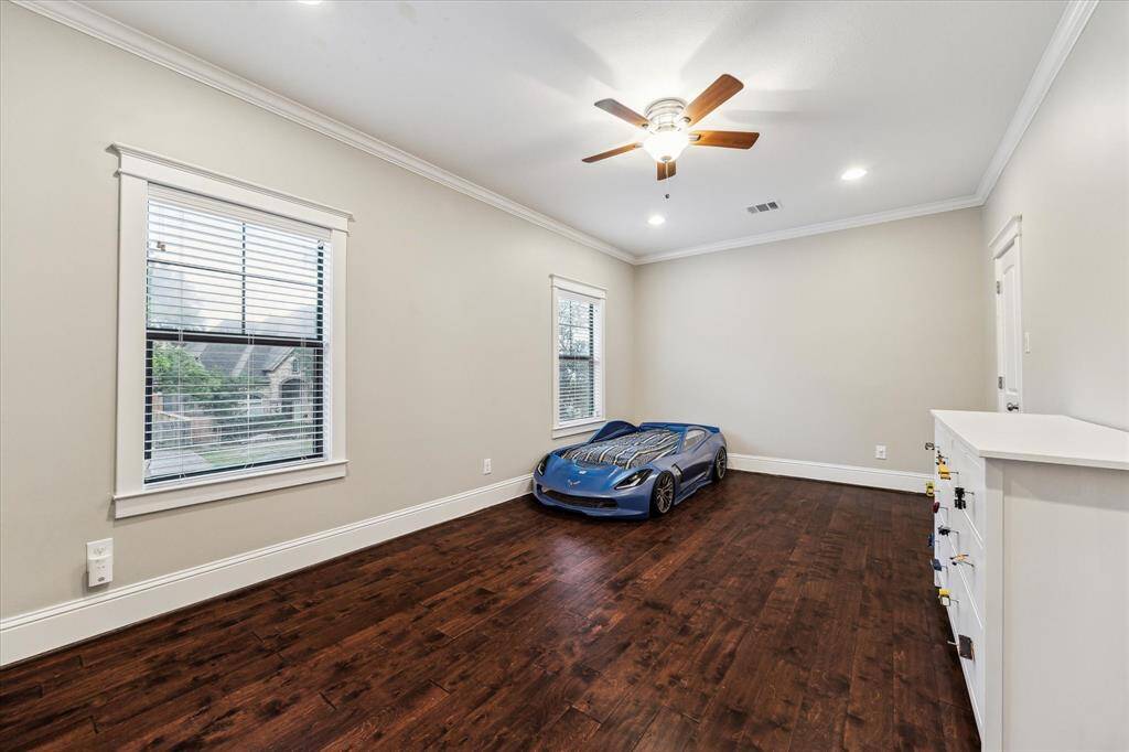Another generously sized bedroom.