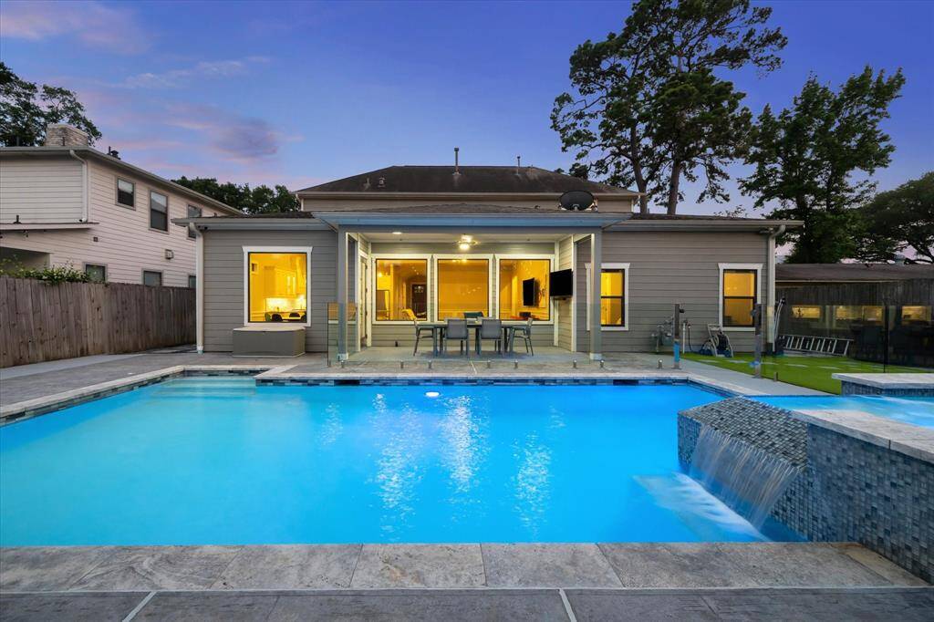 Relax and unwind by the saltwater pool with tranquil water feature.