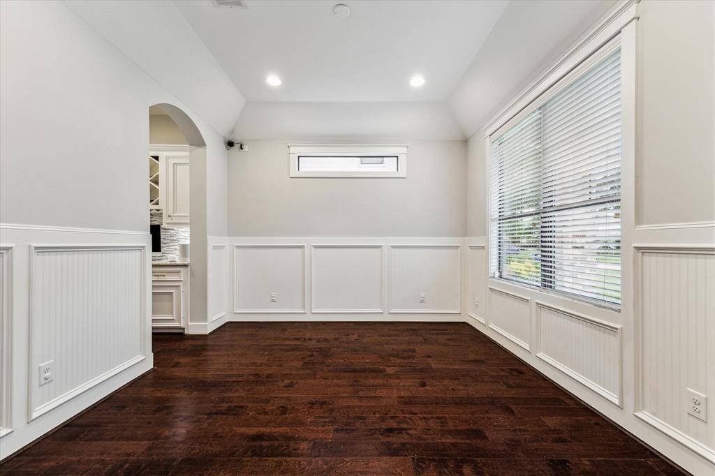 Flexible room perfect for formal dining, a playroom, or home gym.