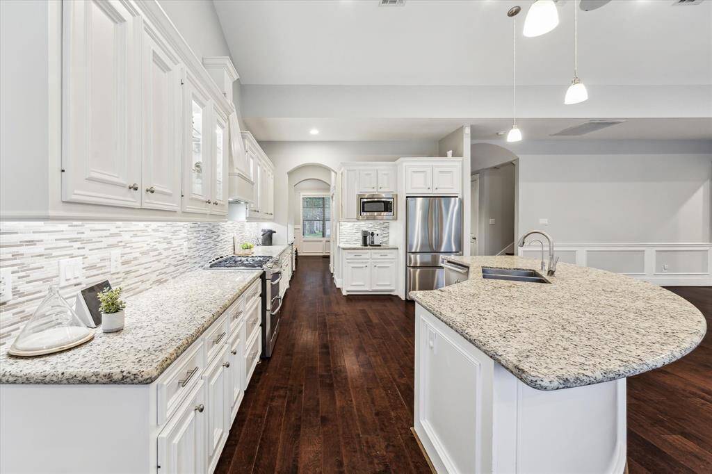 A kitchen that works as hard as you do—plenty of storage and a handy butler’s pantry.