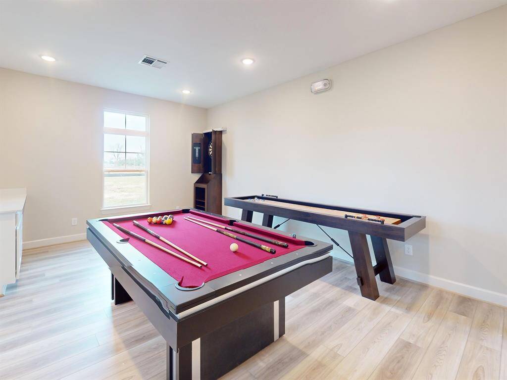 Perfect for accommodating guests, creating a private retreat, or setting up a productive workspace, this thoughtfully designed space features a cozy living area, and a full bathroom, ensuring comfort and convenience. *Image depicts similar floor plan in the community and is virtually staged.