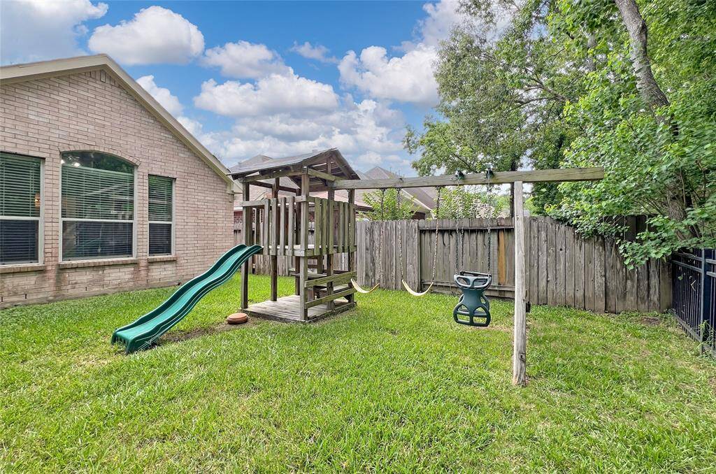 Take a look at the back of the home, featuring a beautiful all-brick exterior.