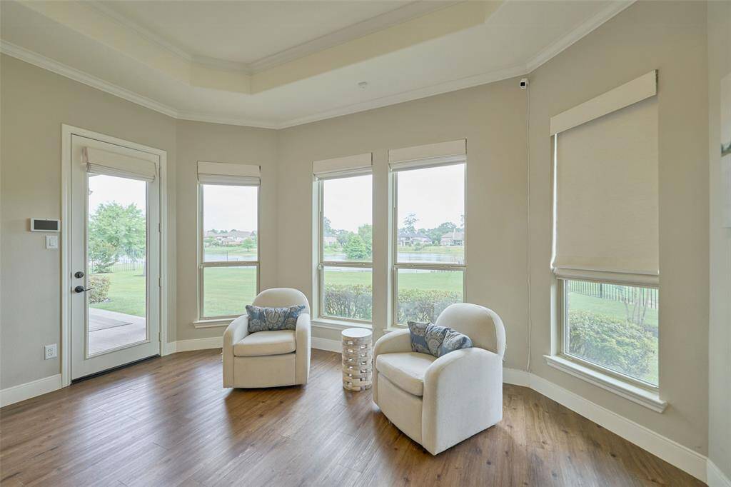 Expansive primary bedroom with breathtaking views and direct patio access.