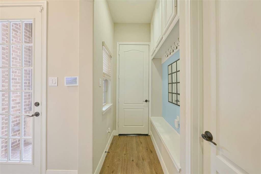 This smart layout offers direct access from the garage to the laundry room, powder room, and kitchen.