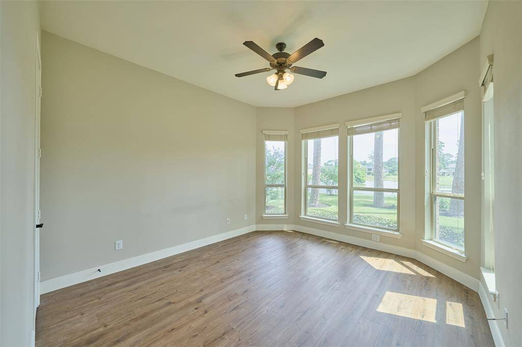 Bright and spacious downstairs bedroom with tranquil lake views.