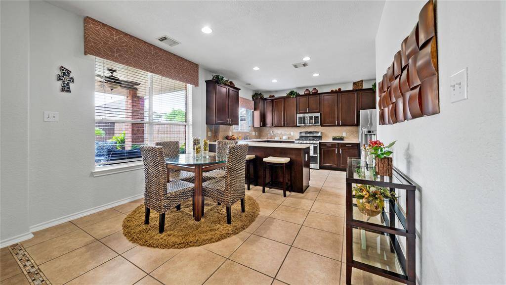 Breakfast nook open to the family room and kitchen