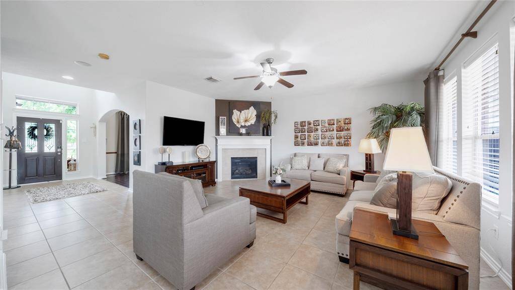 Expansive foyer with an inviting family room
