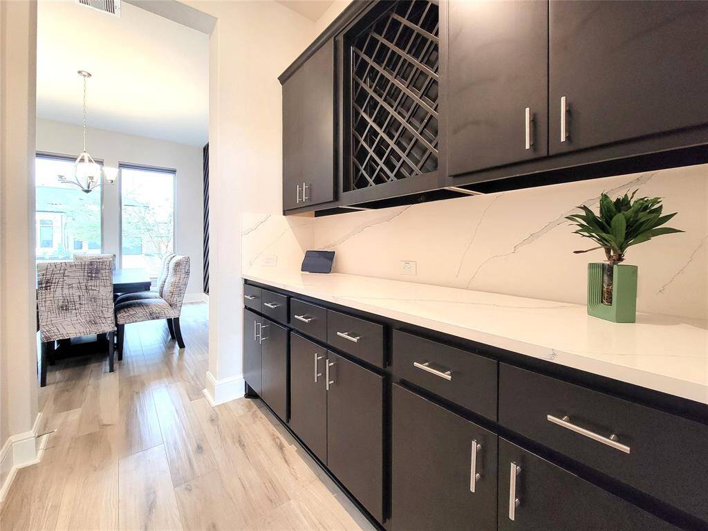 Butler's Pantry with wine rack & so much counter space.