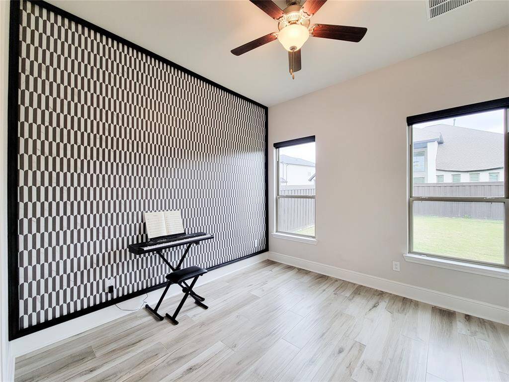 Bedroom # 2 on first floor with ensuite bathroom. Great as Guest Bedroom.